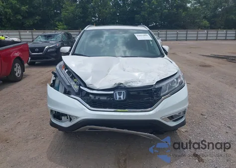 2016 Honda Cr-V Touring z USA, uszkodzony, nr VIN 5J6RM4H95GL118070